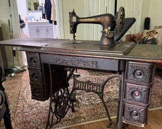 antique singer sewing machine and cabinet