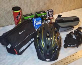 FHM089 - 2 Bicycle Bags, 5 Inner Ttubes, 1 Can Tennis Balls, 1 Bell Bicycle Helmet and Razor Rollers
