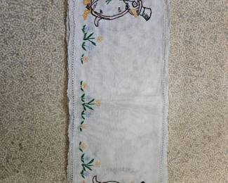 Lots of beautiful needlework.