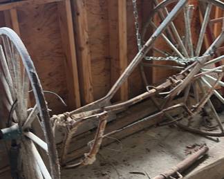 Wagon wheels & various parts. Right now the axle is attached & several pieces of hardware is included