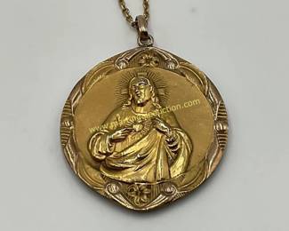 gold tone pendant