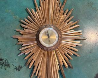 OK THIS INSANE MCM GILDED GOLD CLOCK LIKE WHAAAAATTTTTT.......