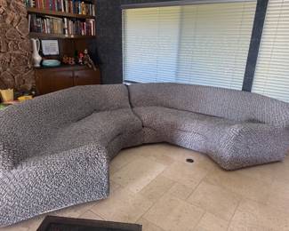 SECTIONAL SOFA WITH AMAZING COVER ON IT