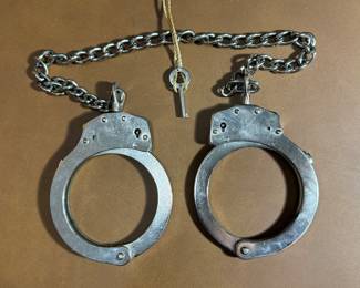 1 pair leg irons w/ key @ $45