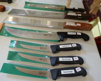 A m6 ft Table Full of Vinntage But New & Never Used Kitchen Knives - Mostly by Fourschner