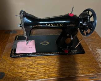 Sewing machine in cabinet, several portable available also