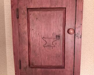 Rustic wall Cabinet with Anvil Carving