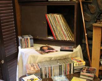 Vinyl records and CD's. Larger Vinyl records are covered and empty covers are available.
