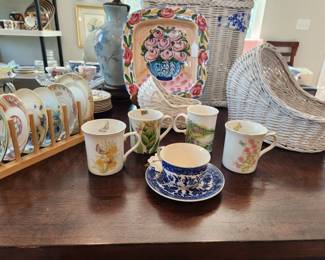 High tea and baby shower ready - wicker bassinetts for floral arrangements and bone china cups and saucers