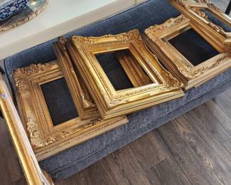Ornate gold portrait wall frames