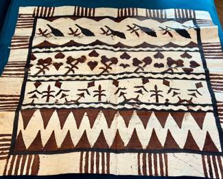 traditional Fijian masi (tapa bark cloth) featuring hand-painted geometric and tribal motifs