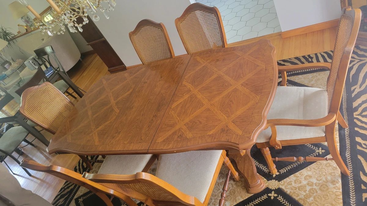 Dining room table set including matching hutch and curio