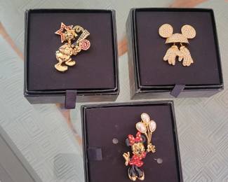 Disney gold toned brooch 