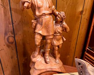 Carved wooden William Tell and Son