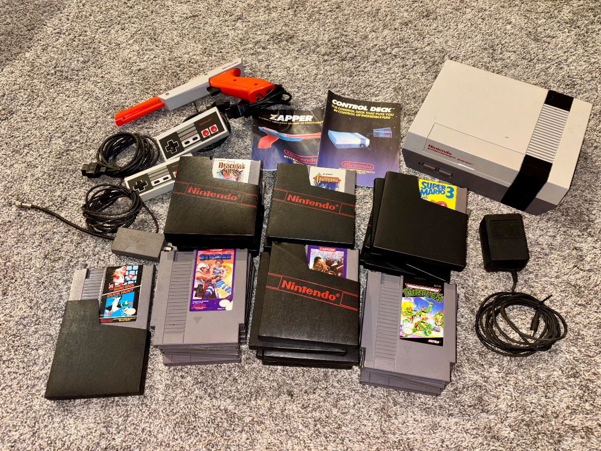 Orignial complete Nintendo Entertainment System (NES) and around 30 games!