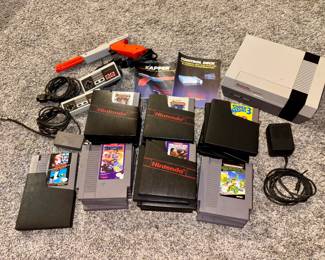 Orignial complete Nintendo Entertainment System (NES) and around 30 games!