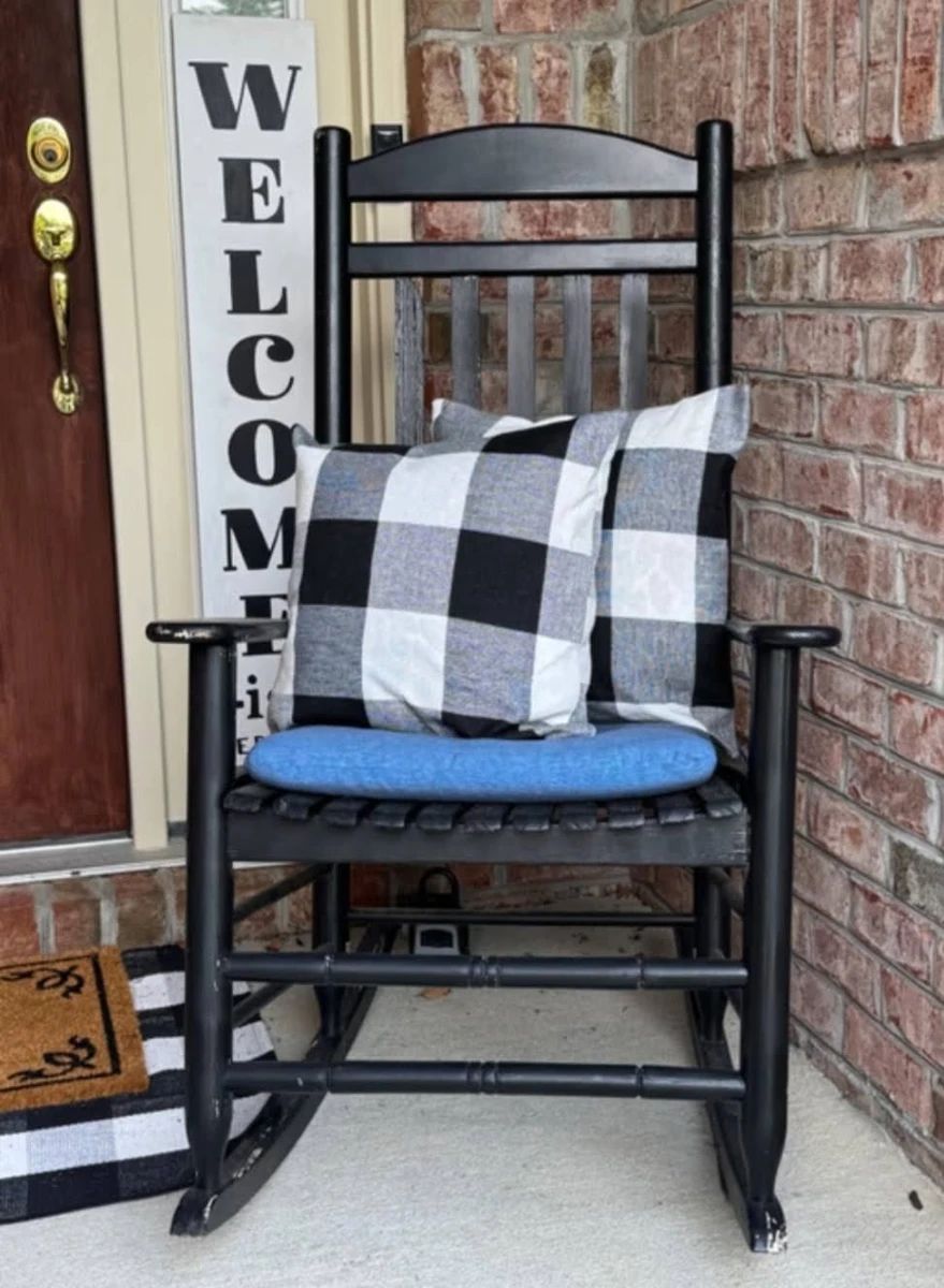 'WELCOME' sign, rocking chair and pillows