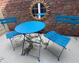 Three piece metal bistro set and large composite sunburst mirror