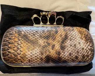 Unique knuckle clutch evening bag