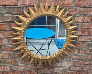 Gold sunburst mirror, composite material