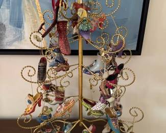Miniature shoe collection, most from the Ashton-Drake Heirloom collection, on a display tree