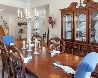 Dining table with fan marquetry inlay and scalloped edges, four chairs and two upholstered chairs