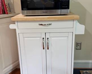 Rolling kitchen cart with a butcher block top, Panasonic microwave
