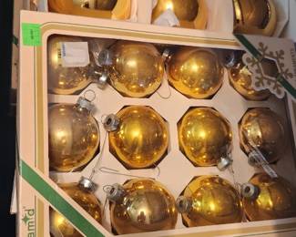 tub of gold ornaments