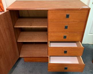 O42 - $225. Teak Veneer Chest of Drawers. Good overall condition. Measures 40” W x 18” D x 39” Tall.