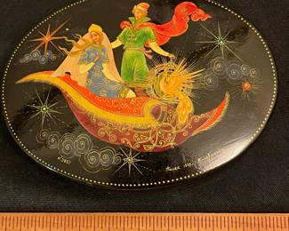 O121 - $30. Palekh Russian Painted Black Lacquer Box. Measures 4.5" W x 3.5" D.