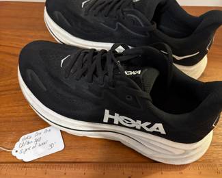 O82 - $30. Hoka One One Clifton. Woman’s Size 10. Shows light wear.