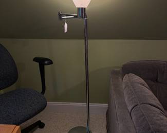 O49 - $20. Floor Lamp. Measures 55" tall.
