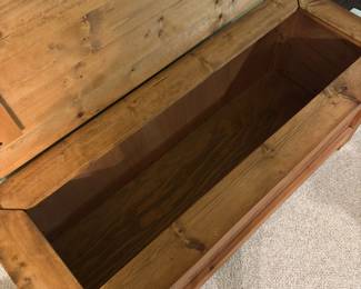 O28 - $75. Wooden Storage Chest. Measures 50” W x 19” D x 20.5” Tall.