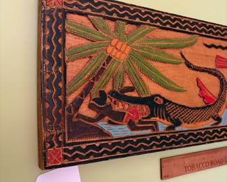 O70 - $60. Palauan Story Board Hand Carved and Painted. Measures 30" W x 9" Tall.