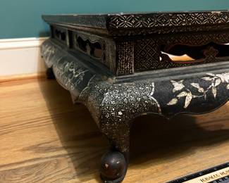O124 - $850. Antique Kang Table. (Possibly Late Ming-early Qing Dynasty. 17th - 18th Century) Mother of Pearl Inlaid Black Lacquer Low Table. Measures 25" W x 14.5" D x 8.5" Tall.