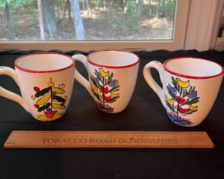 O106 - $25. Set of 3 Vietri Christmas Tree Mugs.