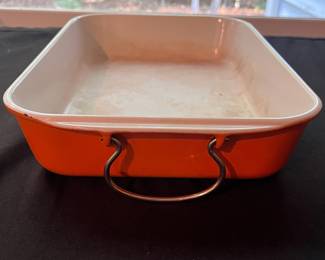O118 - $45. Le Creuset Flame Orange 15” x 10” Iron Roasting Pan.