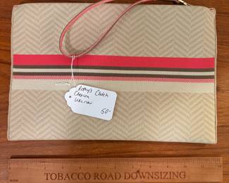 O75 - $50. Rothy’s Clutch Wristlet. Like New.