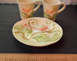 O105 - $25. Vietri "Carmela" Set. 1- Plate 9" D, 2 - Mugs 4.5" Tall. Mugs have crazing and staining on the inside.