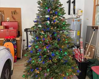 O135 - $350. 7’ 5” Balsam Hill Frazier Fir Christmas Tree with Bag and Stand with bag. .