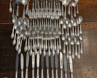 S1 - $7,500. Towle Sterling Flatware Set. 15 of each Dinner Knives, Dinner Forks, Salad Forks, Dessert Spoons. 8 of each Butter Knife, Dinner Spoon. Plus Serving Pieces. Text for Weight.