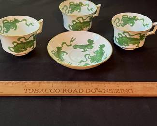 O110 - $400. Set of Wedgwood "Chinese Tigers" Green China. 1 - Coffee Pot, 1 Tea Pot (has a crack), 1 - Saucer, 1 - Trinket Dish, 1 - Cream and Sugar, 3 - Tea Cups, 3 - 8.25" Plates
