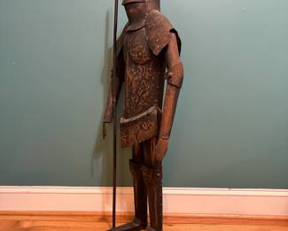 O71 - $95. Metal Knight Sculpture. Measures 16" W x 39.5" Tall.