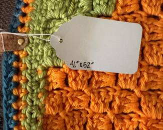 O59 - $35. Handmade Crochet Blanket. Measures 41“ W x 52” L.