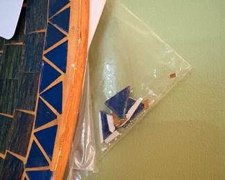 O30 - $5. Tile Mirror. Damaged. Measures 23.5” Diameter.