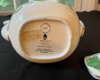 O110 - $400. Set of Wedgwood "Chinese Tigers" Green China. 1 - Coffee Pot, 1 Tea Pot (has a crack), 1 - Saucer, 1 - Trinket Dish, 1 - Cream and Sugar, 3 - Tea Cups, 3 - 8.25" Plates