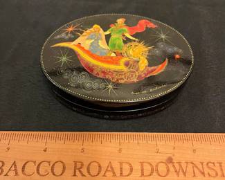 O121 - $30. Palekh Russian Painted Black Lacquer Box. Measures 4.5" W x 3.5" D.