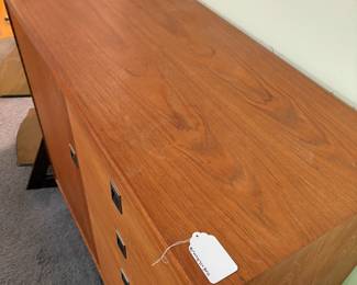 O42 - $225. Teak Veneer Chest of Drawers. Good overall condition. Measures 40” W x 18” D x 39” Tall.