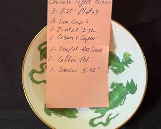 O110 - $400. Set of Wedgwood "Chinese Tigers" Green China. 1 - Coffee Pot, 1 Tea Pot (has a crack), 1 - Saucer, 1 - Trinket Dish, 1 - Cream and Sugar, 3 - Tea Cups, 3 - 8.25" Plates