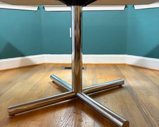 O4 - $125. Table Measures 40” W x 50” L x 28.75” Tall. Blue Laminate top with Chrome Base.